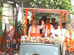 
      
      Amit Shah holds roadshow for BJP candidate KP Prakash Babu in Bey
      
      