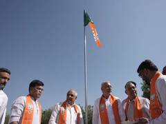 
      
      Gujarat: CM Patel along with workers hoist BJP flag in Gandhinaga
      
      