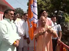 
      
      Gorakhpur: UP CM Yogi hoists BJP flag at Gorakhnath temple o
      
      