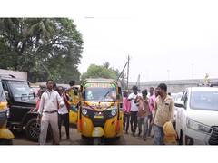 
      
      Anbil Mahesh Poyyamozhi drives auto-rickshaw
      
      