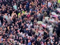 
      
      Mourning in Sidon after Israeli strike kills 13 Lebanese 
      
      