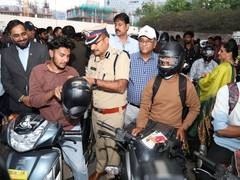 
      
      Helmet Distribution Drive Held in Hyderabad
      
      