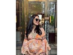 
      
      Surbhi Jyoti flaunts her baby bump in a flowy printed dress
      
      