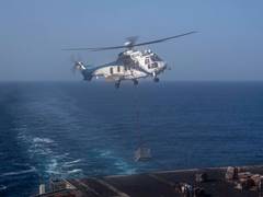 
      
      USS Abraham Lincoln receives supplies during blockade :CENTCOM
      
      