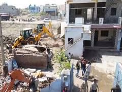 
      
      Encroachment drive amid tight security deployment in Dhandhuka
      
      