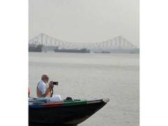
      
      PM Modi admires Howrah Bridge amid boat ride on Hoogly river
      
      