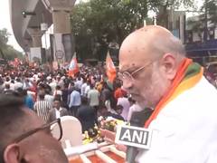
      
      Amit Shah holds massive roadshow in Behala Paschim in final push
      
      