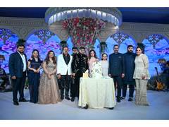 
      
      A Grand Beginning: Engagement Celebrated in Royal Splendor
      
      