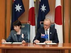 
      
      Japan, Australia ink pact to counter China's resource grip
      
      