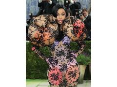 
      
      Cardi B walks Met Gala carpet with fever
      
      