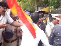 
      
      TVK cadres stage protest outside Lok Bhavan
      
      