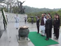 
      
      Rajnath Singh pays tribute at Seoul National Cemetery
      
      