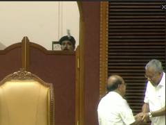 
      
      Vijayan-Sudhakaran shake hands at Kerala Assembly
      
      