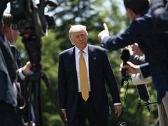 
      
      Trump shares AI pic of 'golden dome' around White House
      
      