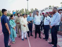 
      
      Administrator reviews preparation for Asian Relay Athletics event
      
      
