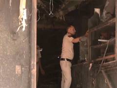 
      
      Malviya Nagar fire: Arrested hotel cook brought to incident site
      
      
