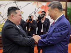 
      Xi arrives in North Korea on first official visit in 7 years
      