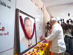 
      
      AI-171 crash anniversary: Gujarat CM pay tribute ex CM Rupani
      
      