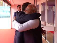 
      
      French President greets PM Modi with warm hug
      
      