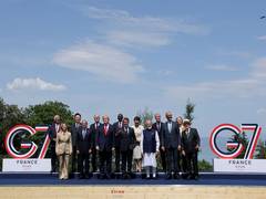 
    PM Modi joins world leaders for traditional G7 group photograph
    