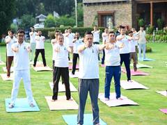
      
      Uttarakhand CM participates in yoga session with officials
      
      