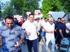 
      
      CM Dhami participates in 'Run for Yoga' event in Dehradun
      
      