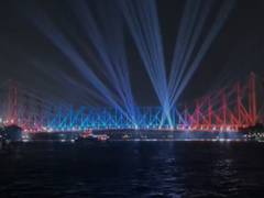 
      
      Kolkata's Howrah Bridge lights up for International Yoga Day 
      
      