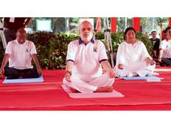 
      
      HM Amit Shah, Gujarat CM participate in Yoga Day event in Gujarat
      
      
