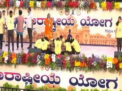 
      
      Bengaluru celebrates International Yoga Day with mass participatn
      
      