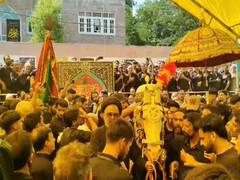 
      
      J-K: Muharram procession held in Budgam amid tight security
      
      