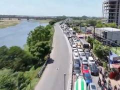 
      
      Residents block Trichy-Chennai highway over Bridge repair
      
      
