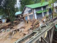 
      
       Search teams retrieve another body from debris of NEEPCO Colony,
      
      