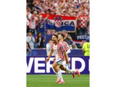 
      
       Vlasic's late header sends Croatia into WC round of 32
      
      