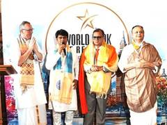 
      
      CEO Santosh Shukla was honored by Shri Rajrajeshwar Guruji 
      
      