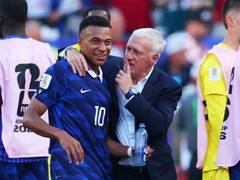 
      
      Deschamps defends Mbappe after France seal quarterfinal berth
      
      