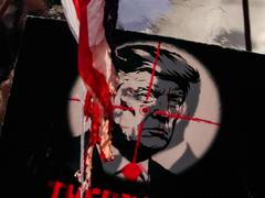 
      
      Mourners carry 'Kill Trump' banners at Khamenei's funeral
      
      