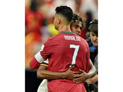 
      
      Spain's Yamal hugs emotional Cristiano after Portugal's WC exit
      
      