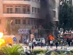 
      
      Explosions heard near Syrian hotel where French PM was to stay
      
      