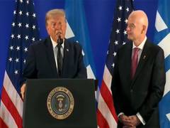 
      
      US President Trump hails Messi, Ronaldo, Kane ahead of WC final
      
      