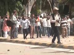 
      
      Stone-pelting outisde Congress' office amid BJP's protest
      
      