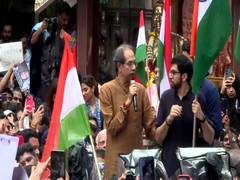 Uddhav Thackeray leads Tricolour rally against NEET action