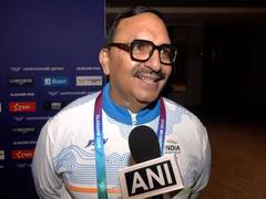 
      
      Coach Jitender Pal Singh celebrates Jhandu Kumar's bronze at CWG
      
      