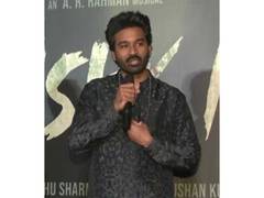 
      
      Fans throng Dhanush's residence on his birthday to catch his...
      
      