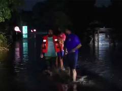 
      
      Gujarat: Fire Department rescues three stranded amid flooding
      
      