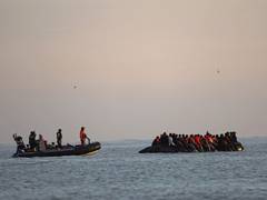 
      
      Over 150 migrants rescued from burning boat in English Channel 
      
      