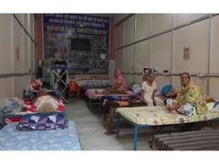 
      
      Daughters watch father’s last rites via video call
      
      