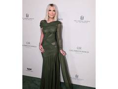 
      
      Tori Spelling on '90210MG' exit
      
      