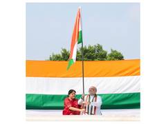 
      
      Union Minister Amit Shah hoists Tiranga flag at his residence
      
      