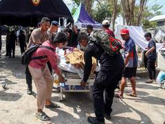 
      
      At least 47 killed as magnitude 7.7 earthquake hit Indonesia
      
      