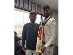 
      
      Sanat Sangwan recalls experience of batting with Virat Kohli
      
      